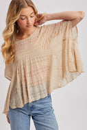 SHEER ASYMMETRIC TEXTURED CAPE TOP